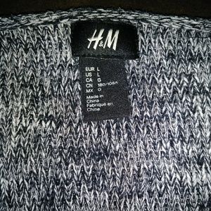 Gray and white sweater